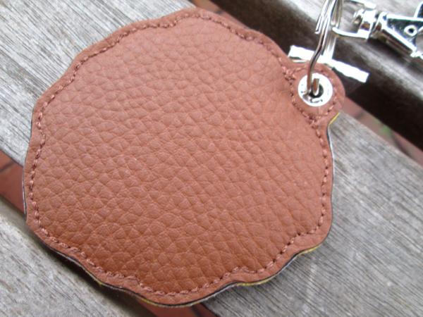 Preview: Rückseite des Löwen-Taschenanhängers