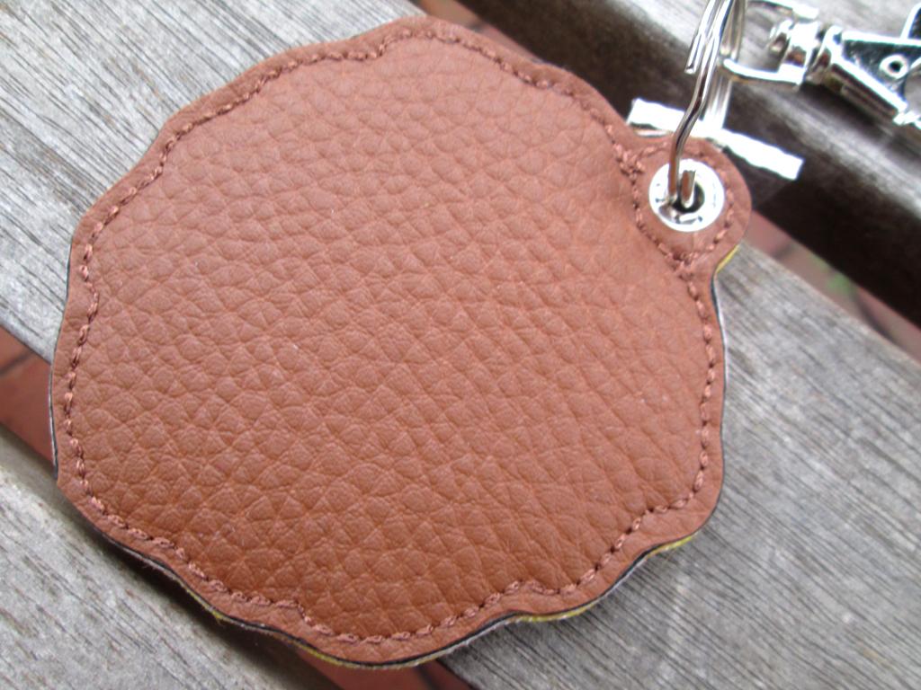 Rückseite des Löwen-Taschenanhängers